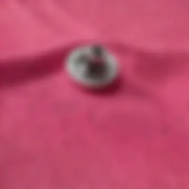 Close-up of the fabric and design details of the hot pink Vans shirt