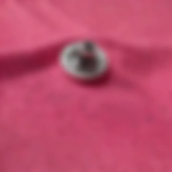 Close-up of the fabric and design details of the hot pink Vans shirt