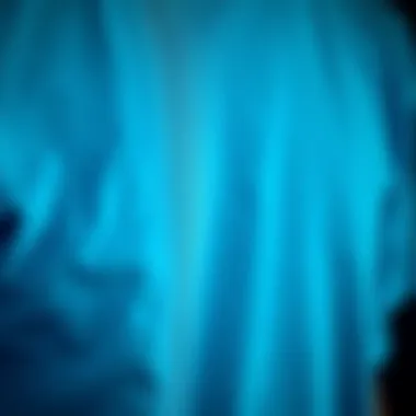Close-up of fabric texture of an aqua blue tee shirt highlighting quality materials.