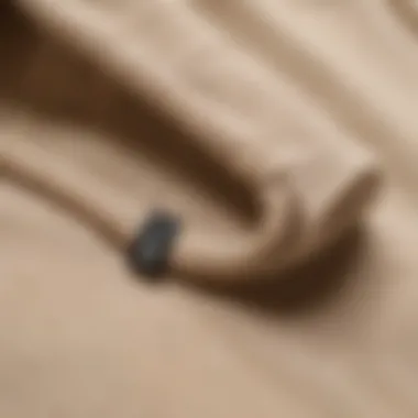 Close-up of beige Nike hoodie fabric showcasing texture and quality