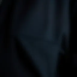 A close-up view of the black tech jacket's fabric showcasing its durability and texture.