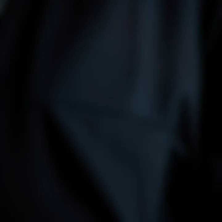 A close-up view of the black tech jacket's fabric showcasing its durability and texture.