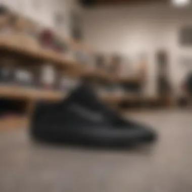 A stylish pair of black Vans displayed on a skateboard in a retail setting