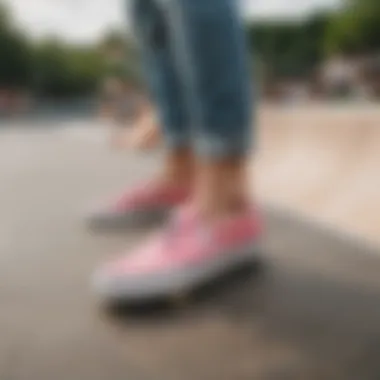 Skateboarder performing tricks while wearing Flamingo Vans slip-ons