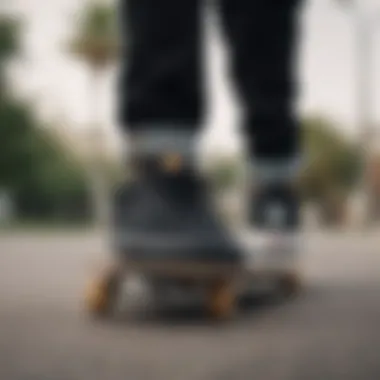 A dynamic shot of black canvas Vans in action on a skateboard.