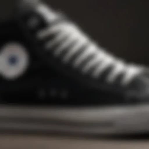 Close-up view of the Converse Chuck Taylor Classic Black showcasing its iconic silhouette and canvas material.