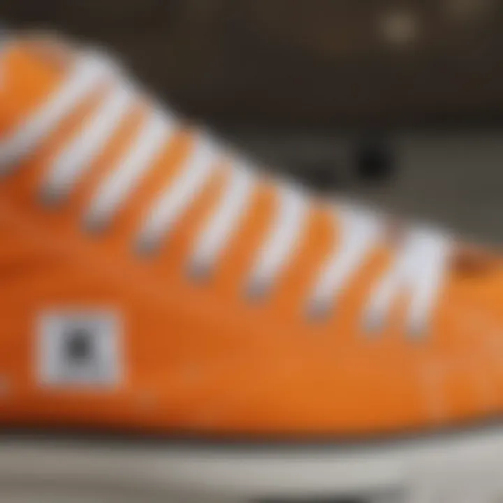 Close-up of the Converse Chuck Taylor orange design and branding