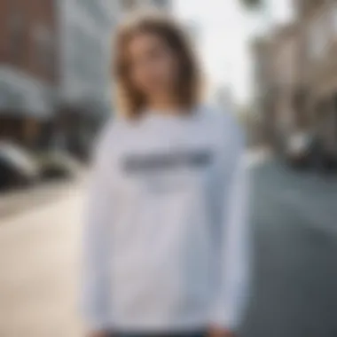 A collection of white Vans shirts displayed in an urban setting