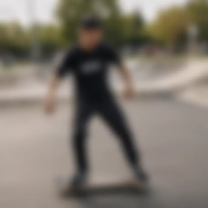 Skater wearing RVCA black t-shirt while performing a trick in the skate park