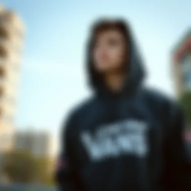 Skater in Urban Setting with Vans Hoodie A skater wearing a Vans hoodie in an urban setting.