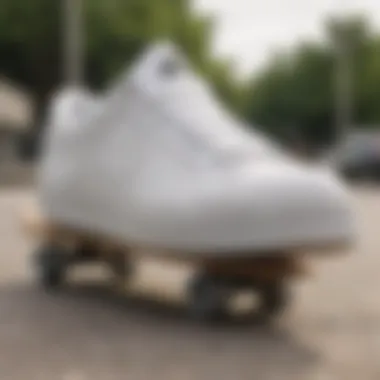White Nike Lowtops on a Skateboard Close-up of white Nike lowtop sneakers on a skateboard