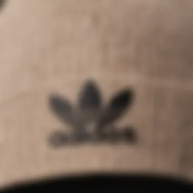 Textural Detail of Adidas Beanie Close-up view of the Adidas beanie showcasing its fabric texture.