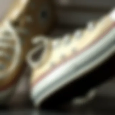 Close-up of the texture and materials used in cream Converse sneakers