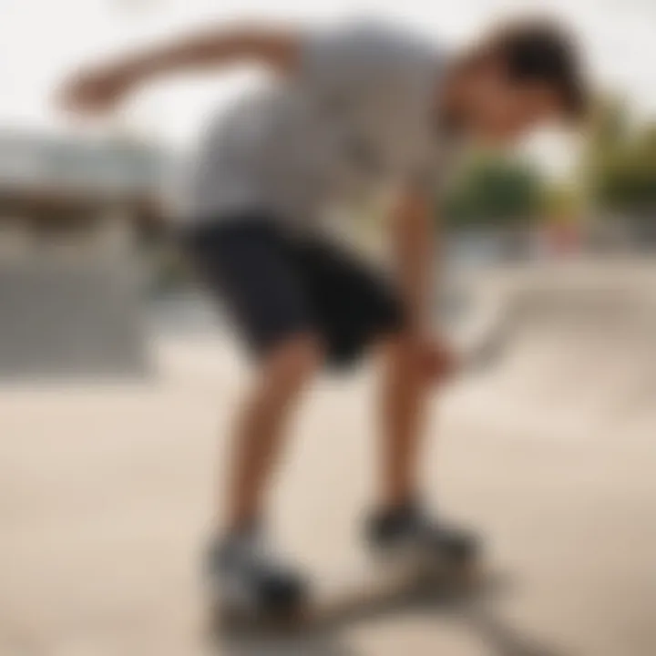 Skateboarder adjusting shorts in a skate park setting