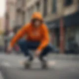 Skateboarder showcasing a hunter orange sweatshirt in an urban environment