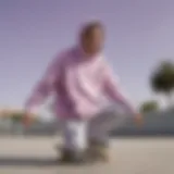 A stylish skater wearing a pastel purple hoodie performing a trick on a skateboard