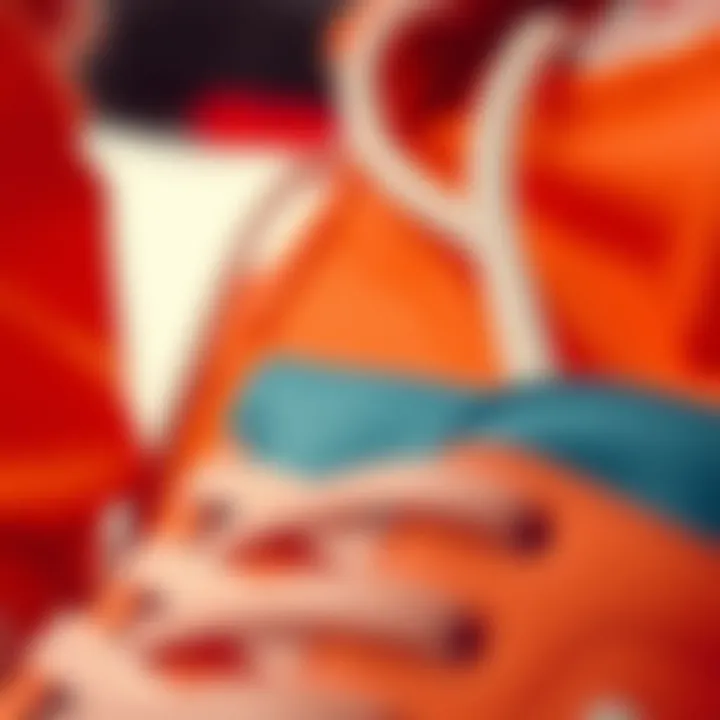 Close-up of unique design elements and textures of an orange Adidas outfit