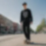 Classic black long sleeve t-shirt on a skateboard