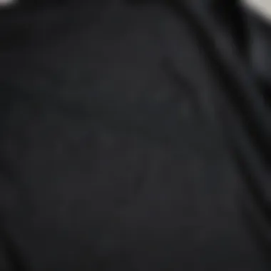 Close-up of fabric texture of black long sleeve t-shirt