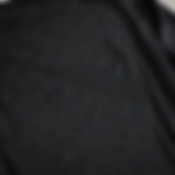 Close-up of fabric texture of black long sleeve t-shirt