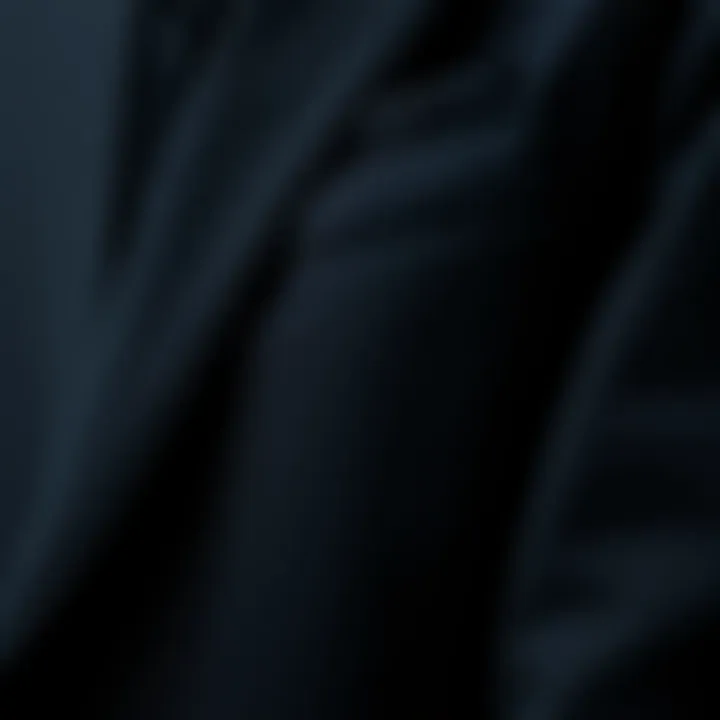 Close-up of black blazer fabric and stitching details