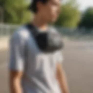 Fashionable integration of the black shoulder fanny pack into skate style