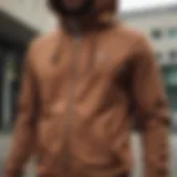 Brown Nike zip-up hoodie showcasing its stylish design