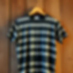 Vintage striped t-shirt displayed on a rustic wooden background